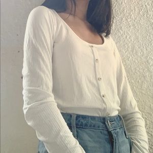 white ribbed long sleeve shirt with button detail